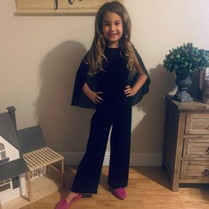 Black jumpsuit with a cape!